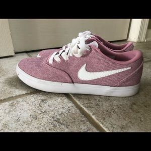 size 8 pink Nike sneakers